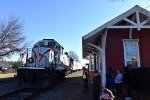 The 3024 resting with the TFT train right next to the restored Wyckoff Station Building